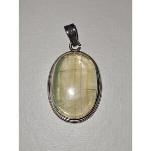 Natural Green Rutilated Quartz Pendant set in sterling silver, handmade.